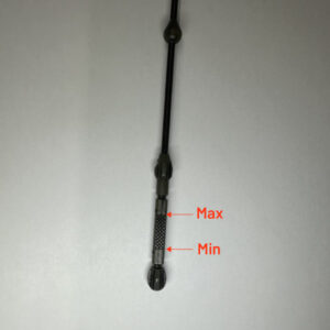 Photo of a dipstick from a Volkswagen with the min and max lines labelled.